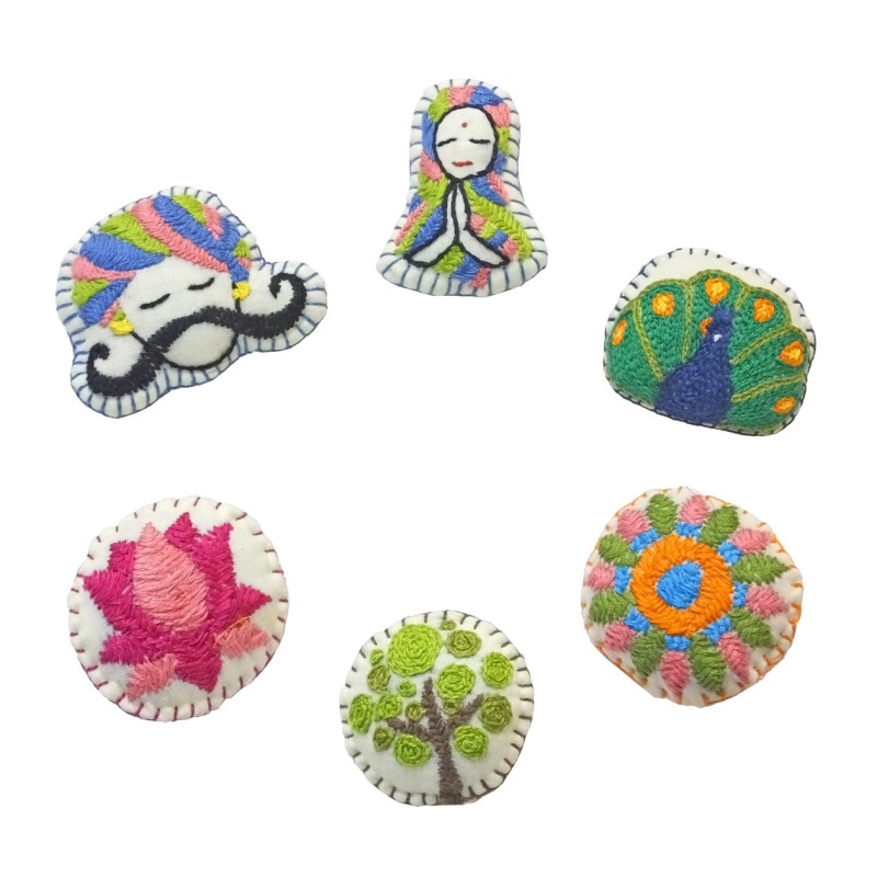 Broches tela bordados