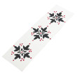Marcapáginas de papel reciclado con estampado floral en color negro y detalles de pequeños puntos rojos
